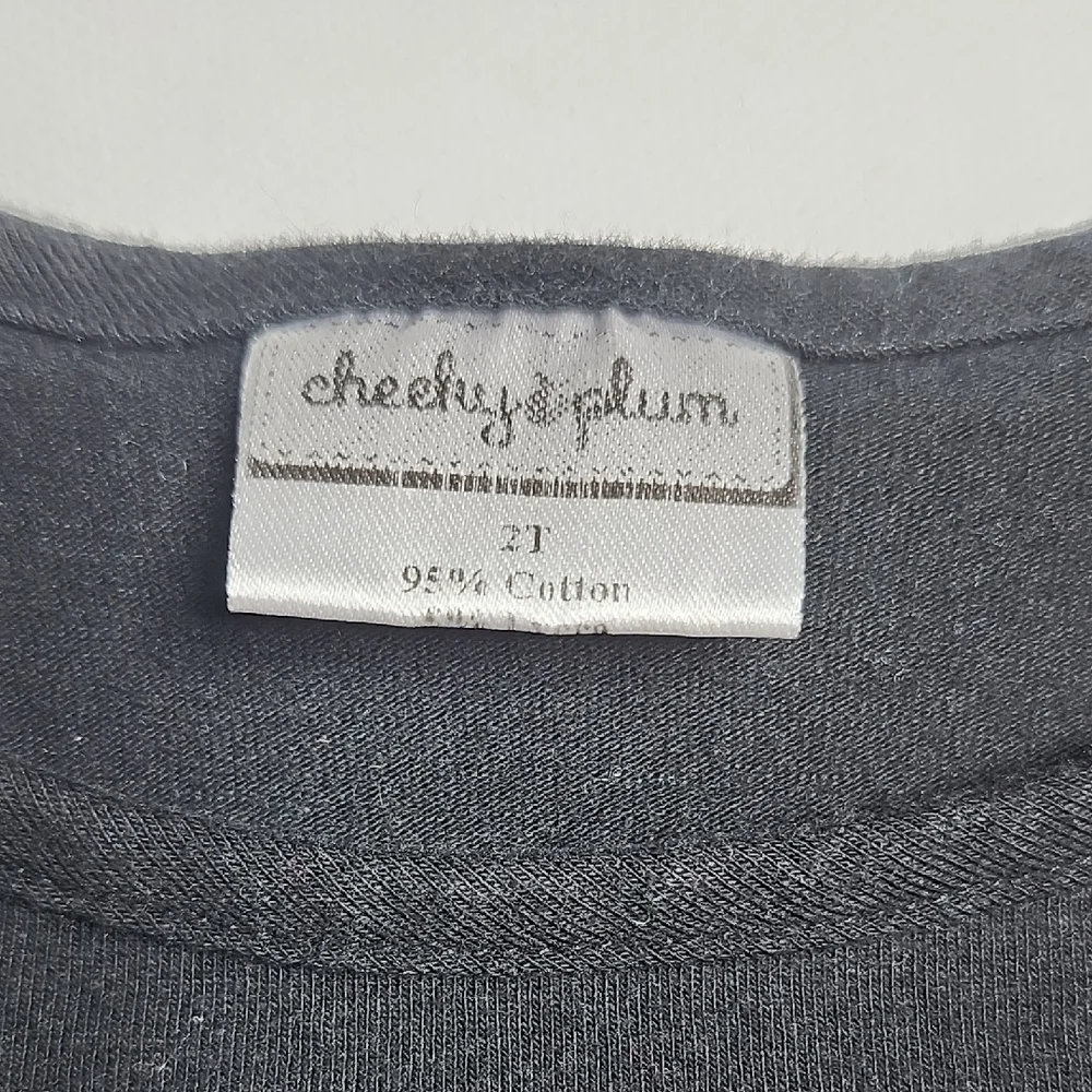 Cheeky Plum Black Long Sleeve with Ruffle Cuffs Kids Top
